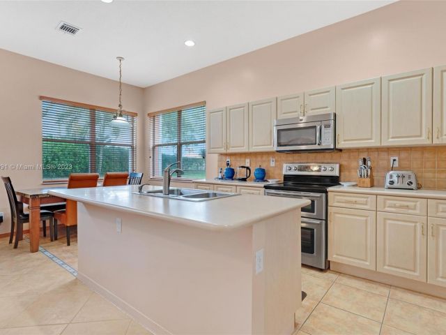 Home for sale at 7635 NW 23rd St - photo 5119115