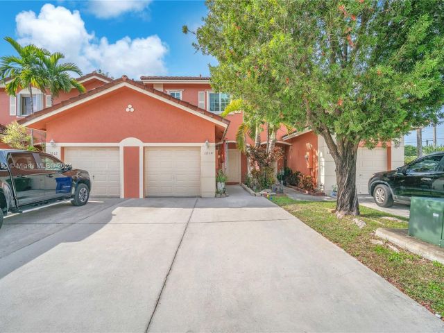 Home for sale at 1214 NW 100th Ave 1214 - photo 5319441