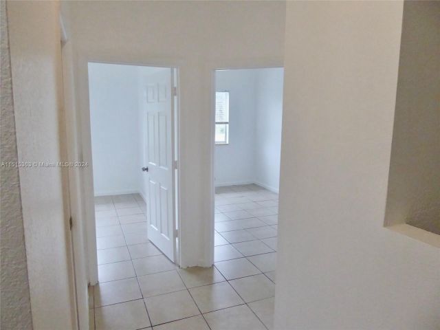 Home for rent at 1540 NW 45th St 1-4 - photo 4869115