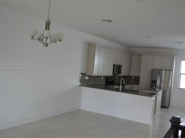Home for rent at 11643 SW 13th Ct 11643 - photo 4964539