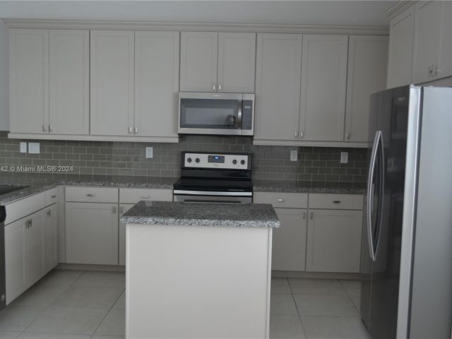 Home for rent at 11643 SW 13th Ct 11643 - photo 4964545