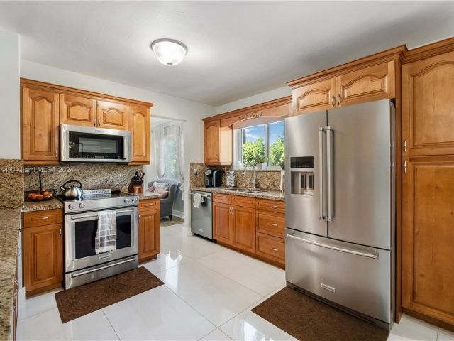 Home for sale at 9621 SW 58th St - photo 5010743