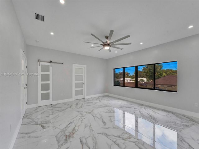 Home for sale at 4702 NW 10th Ave - photo 5025715