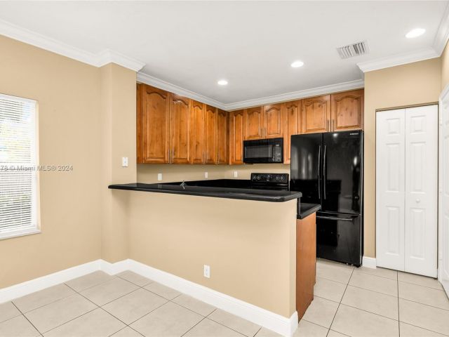 Home for sale at 414 NE 1st Ave 414 - photo 5026470