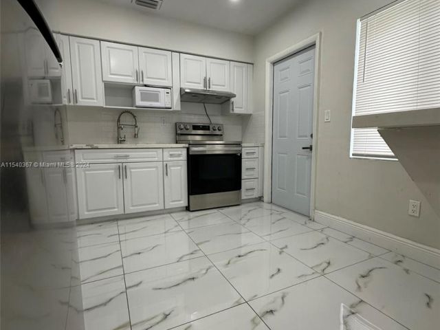 Home for rent at 6900 NW 28th Ave 0 - photo 5055316