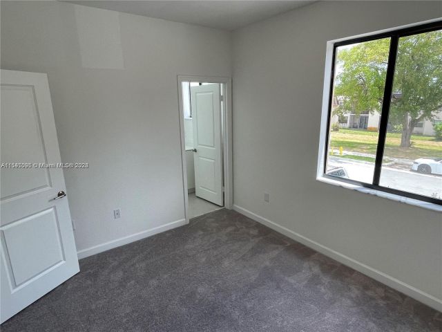 Home for rent at 883 NE 211th St 883 - photo 5093431