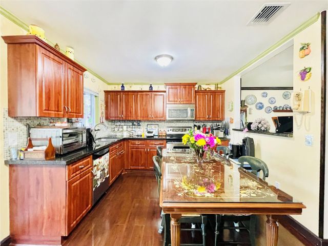 Home for sale at 151 SE 3rd St - photo 5115602