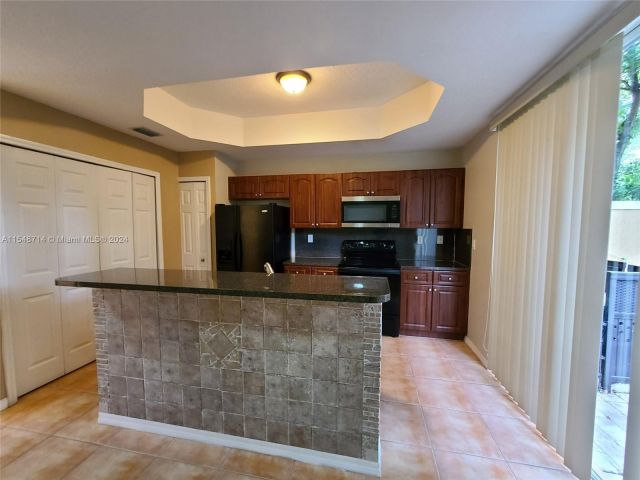 Home for rent at 608 SW 107th Ave 705 - photo 5396138