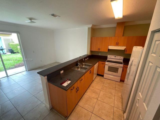 Home for rent at 12030 SW 268th St 53 - photo 5189166