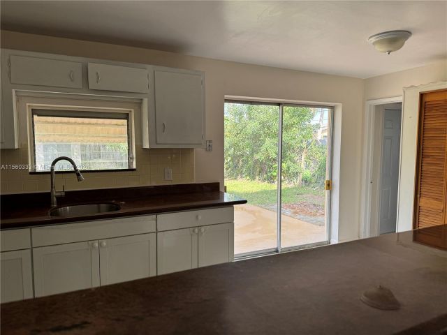 Home for rent at 6111 NW 43rd AVE - photo 5202834