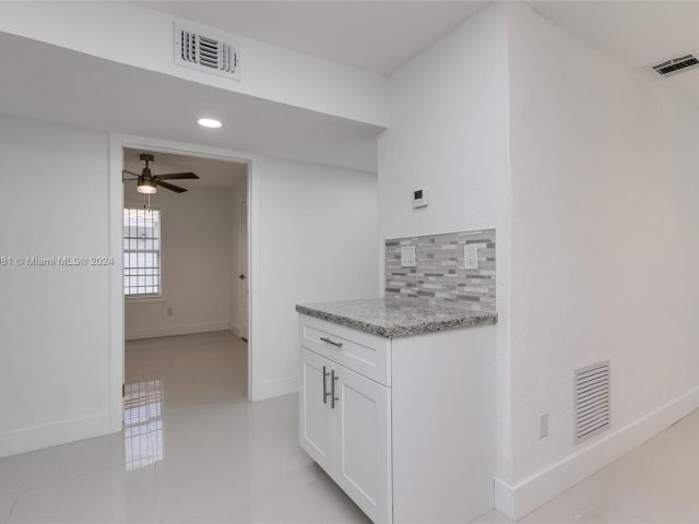 Home for rent at 4811 NW 23rd Ave 4811 - photo 5223814