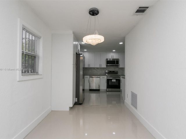 Home for rent at 4811 NW 23rd Ave 4811 - photo 5223816