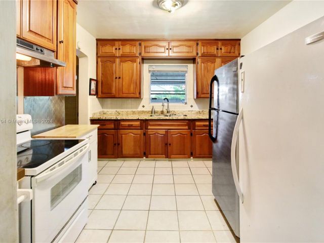 Home for sale at 231 NE 48th Ter - photo 5238521