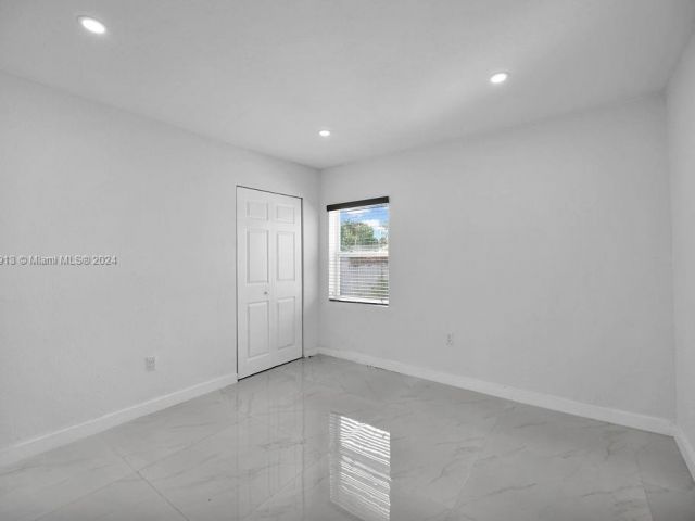 Home for sale at 3455 NW 102nd St - photo 5308922