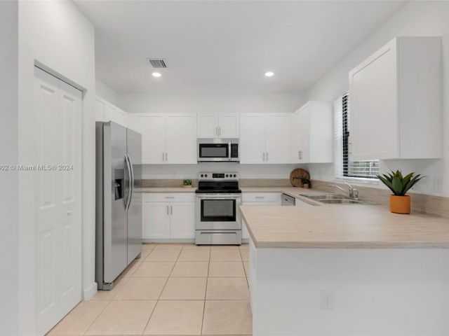 Home for sale at 20913 NE 8th Ave #20913 - photo 5329205