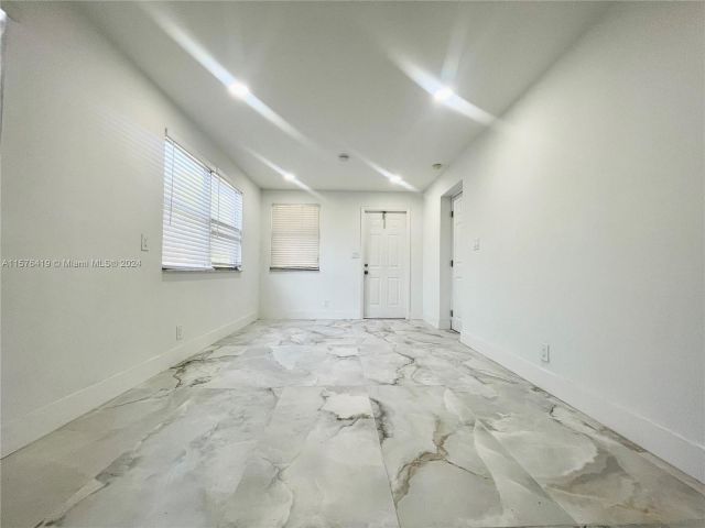 Home for rent at 1649 NE 8th Ave 1649 - photo 5356484