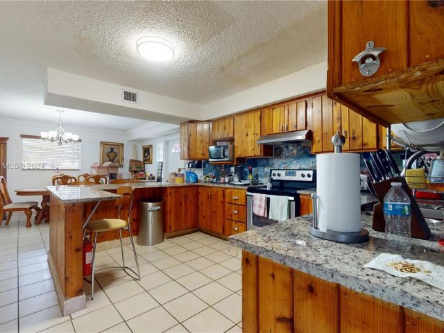 Home for sale at 12215 SW 217th St - photo 5356999