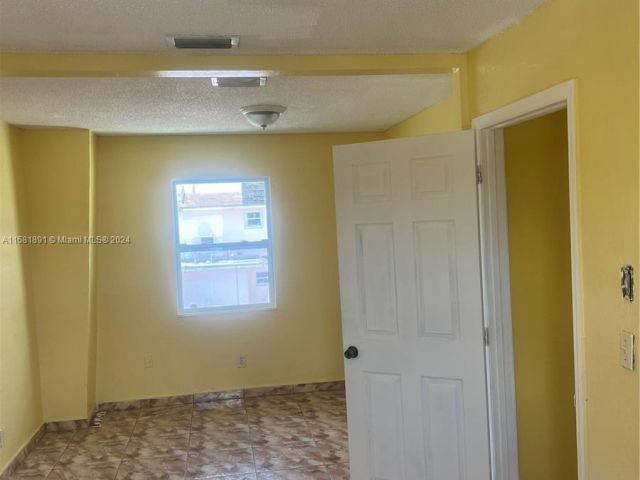 Home for rent at 19320 NW 45th Ave - photo 5380777