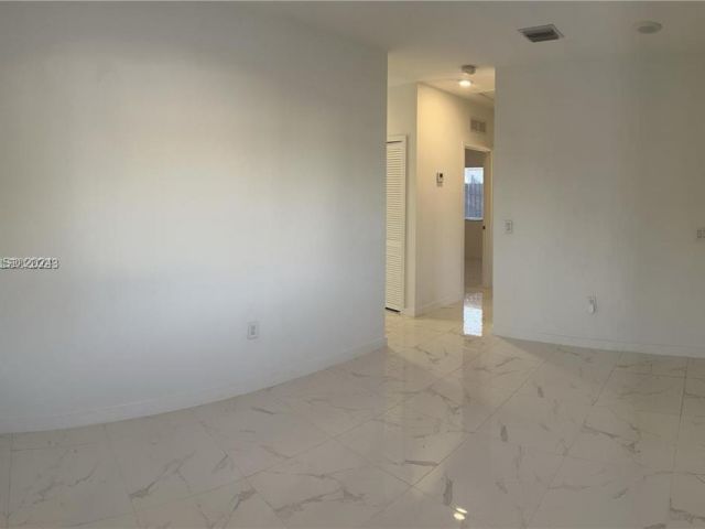 Home for rent at 7930 NW 14th Ave - photo 5379789