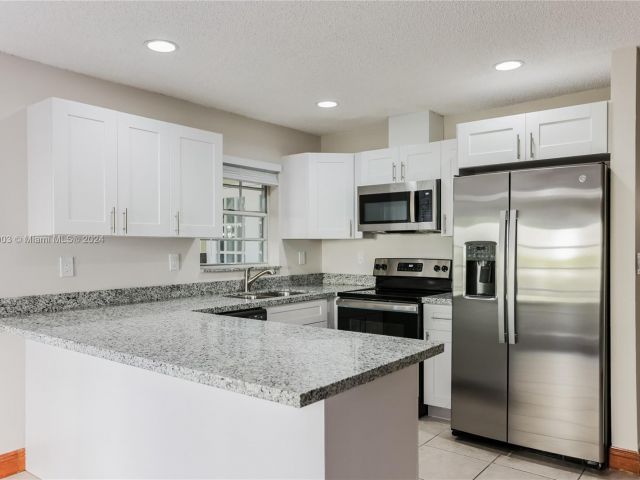 Home for sale at 9970 SW 26th St - photo 5388365