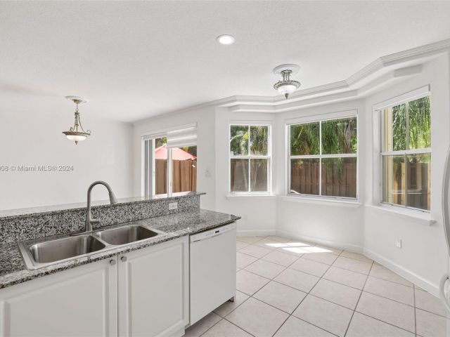 Home for sale at 10970 NW 48th Ter - photo 5456450