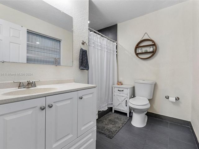 Home for sale at 2510 NE 9th Ave - photo 5417211