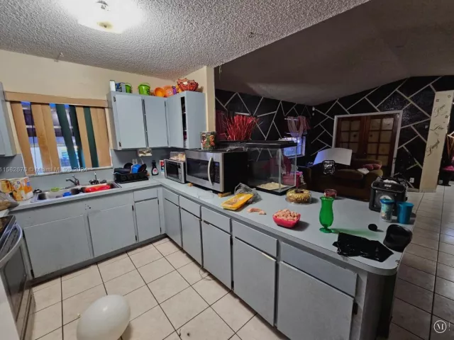 Home for sale at 725 NW 19th Ter - photo 5421436