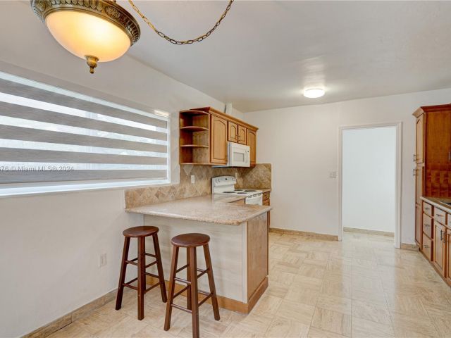 Home for rent at 3635 SW 88th Ct #1 - photo 5428963