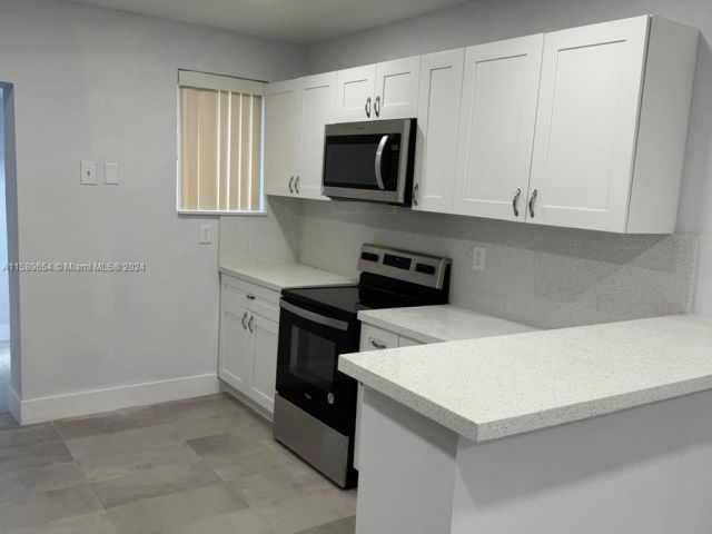 Home for rent at 1220 NW 102nd St - photo 5428886