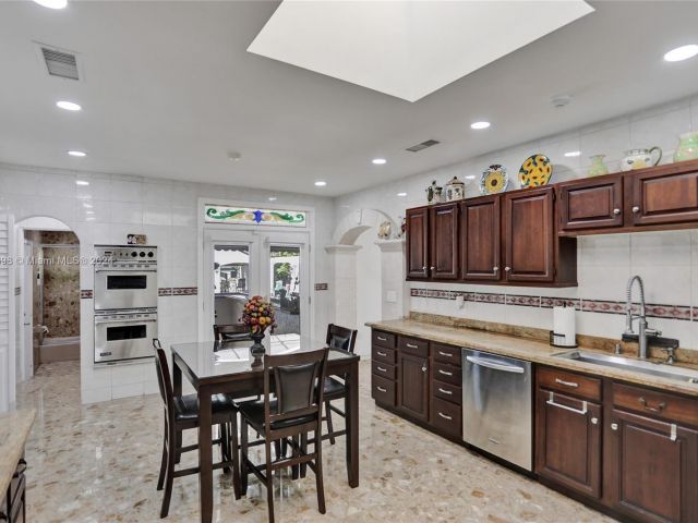 Home for sale at 11835 SW 47th St - photo 5435395