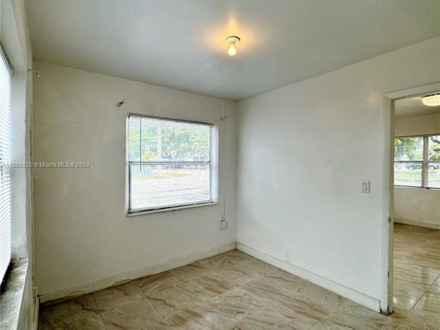 Home for rent at 100 NW 1st Ave 100 - photo 5430587