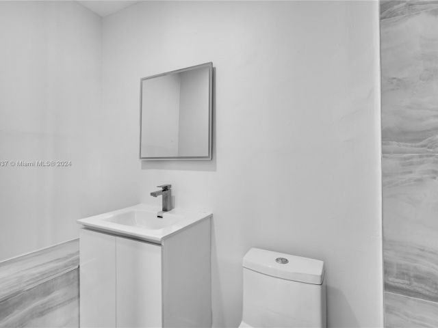 Home for rent at 1937 NE 123rd St 1 - photo 5433231