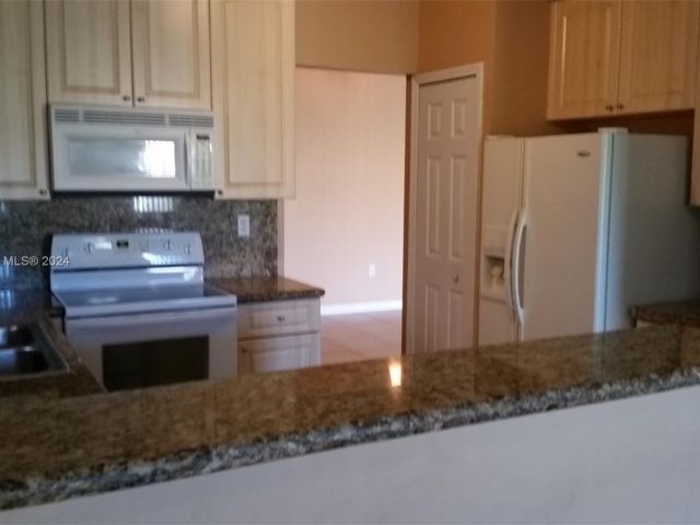 Home for rent at 1580 NE 35th Ave - photo 5442529