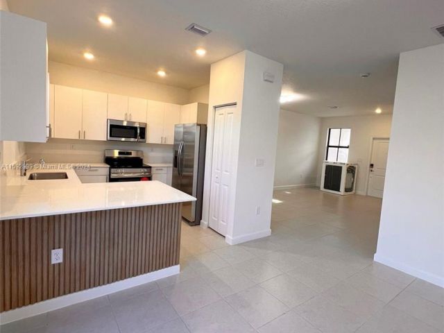 Home for rent at 12946 SW 231st St 12946 - photo 5450209