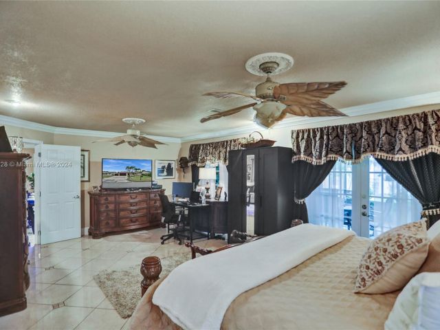 Home for sale at 11525 SW 54th St - photo 5455714