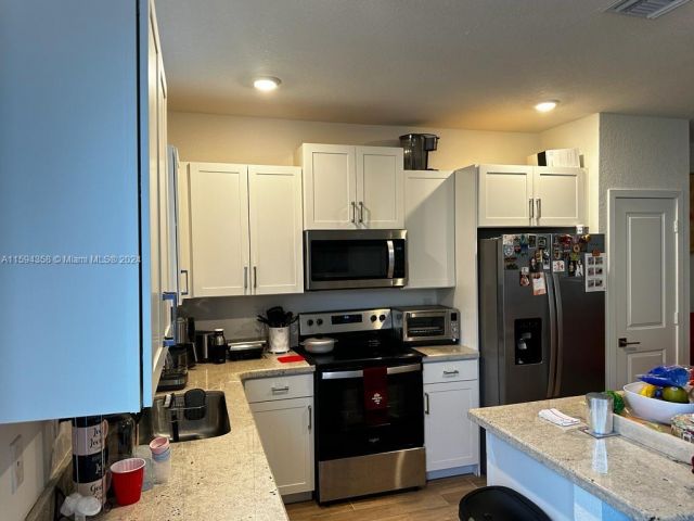 Home for rent at 2459 SE 11th St 2459 - photo 5466024