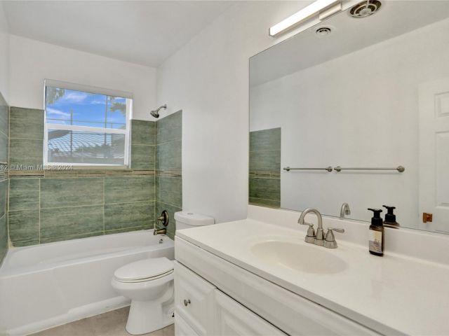 Home for sale at 1040 NE 176th St - photo 5472019