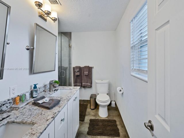 Home for sale at 1640 NE 59th Pl - photo 5462750