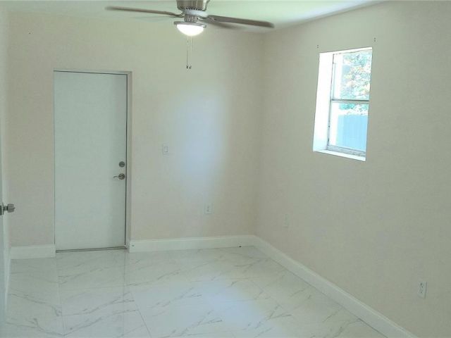 Home for rent at 900 NE 154th St - photo 5511467