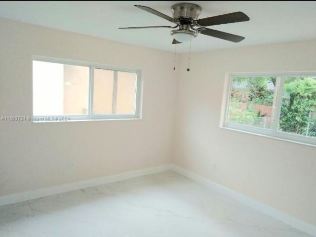 Home for rent at 900 NE 154th St - photo 5511468