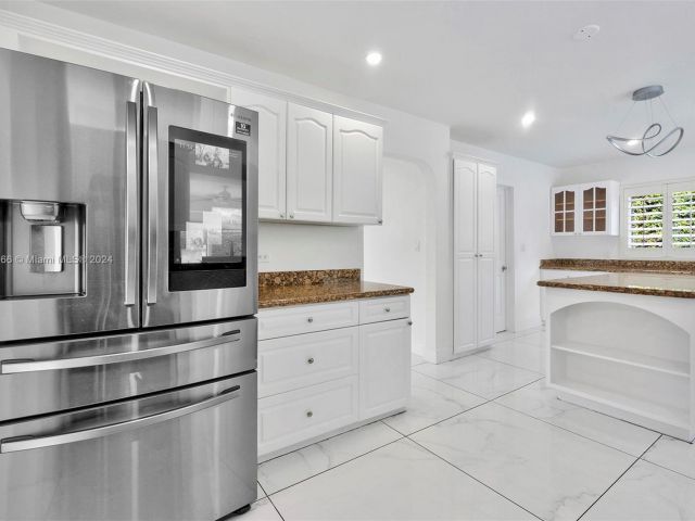 Home for sale at 10223 SW 17th St - photo 5490392