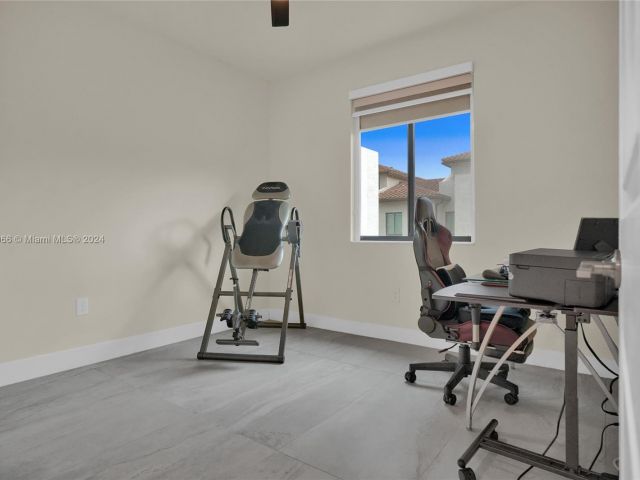 Home for sale at 4680 NW 83rd Pkwy 4680 - photo 5475204