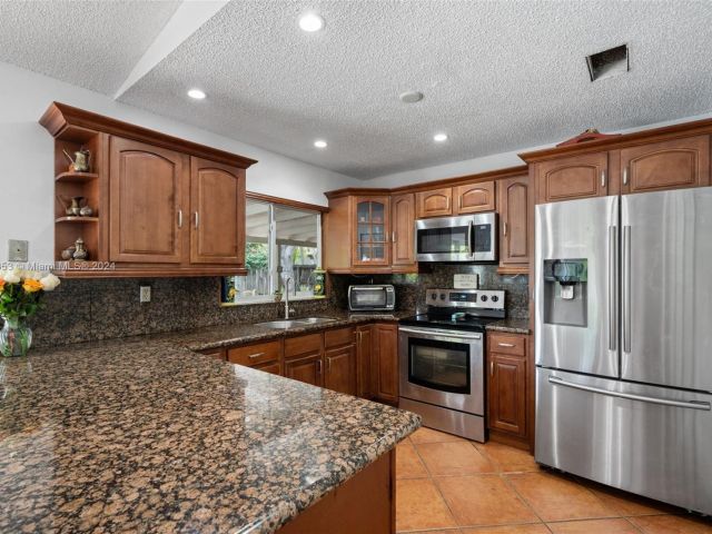 Home for sale at 9910 W Calusa Club Dr - photo 5478908