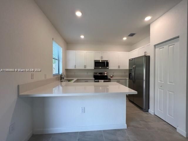 Home for rent at 327 NE 208th Ter 327 - photo 5484800