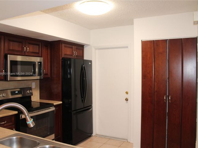 Home for rent at 9708 NW 24th Ct 9708 - photo 5484983