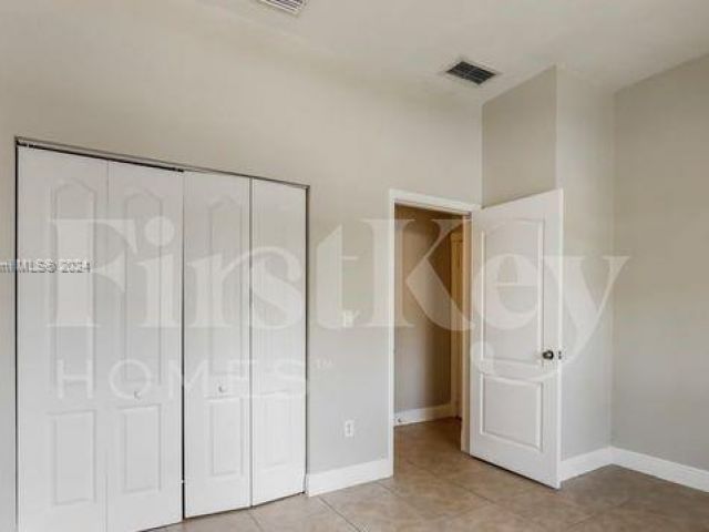 Home for rent at 1695 NE 37th Pl - photo 5489885