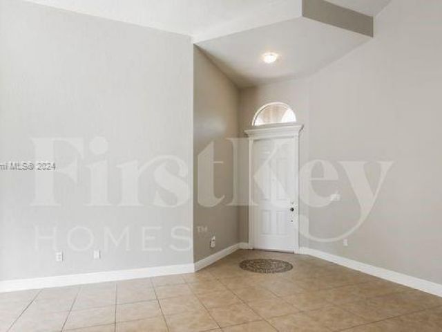 Home for rent at 1695 NE 37th Pl - photo 5489891