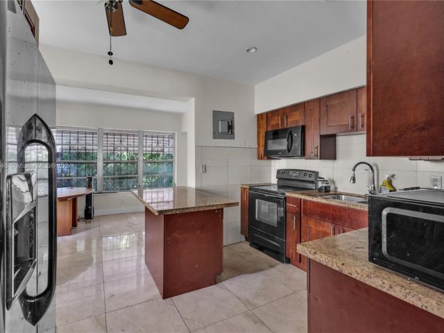 Home for sale at 565 NW 98th St - photo 5491523