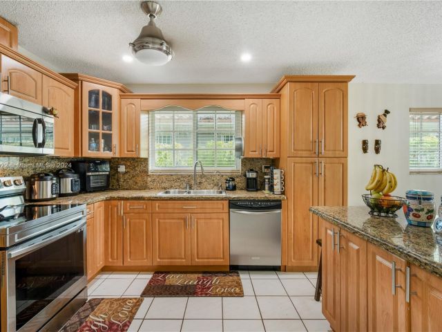 Home for sale at 2245 SW 62nd Ave - photo 5579126