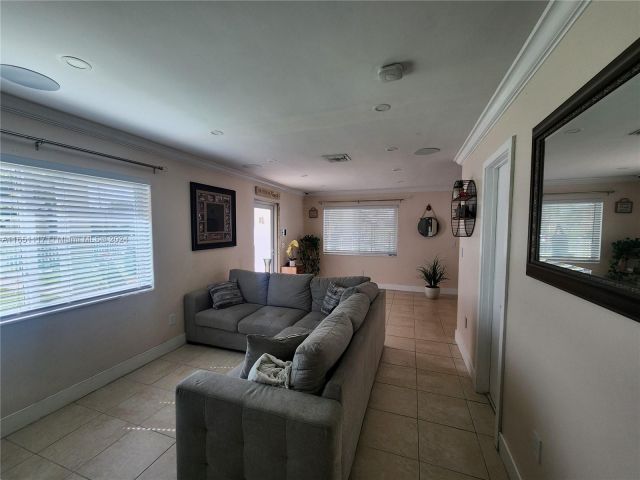 Home for sale at 1025 NE 13th Ave - photo 5774765